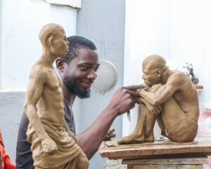 Kelly Omodamwen, an experimental metal sculptor profiled by Folio Nigeria. Supplied.