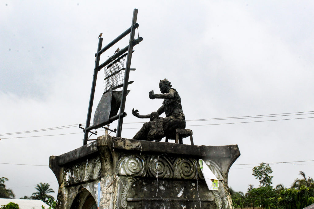 A statue of a weaver in Akwete town, Abia State, Nigeria. Image from Eco Warrior Princess.
