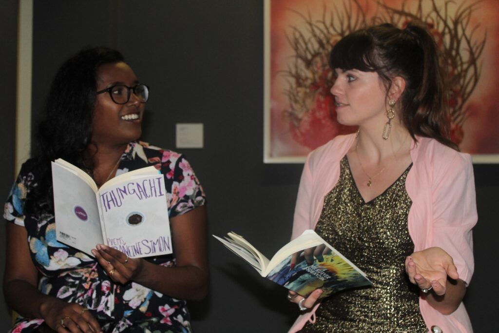 uHlanga-published poets Francine Simon and Megan Ross at a reading. Supplied.
